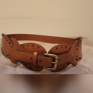 Brown  belt with metal embellishment,  man made material. Jessica Simpson.
